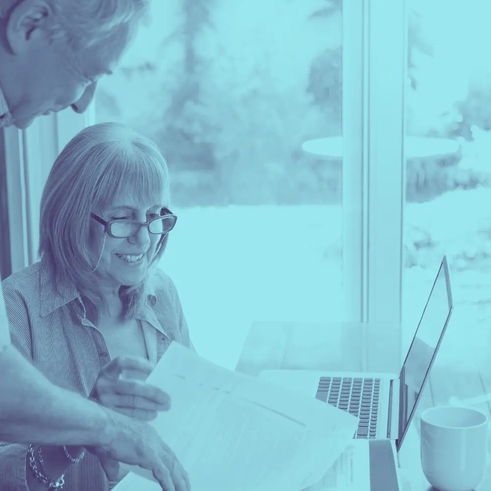 Older adults reviewing long-term care documents